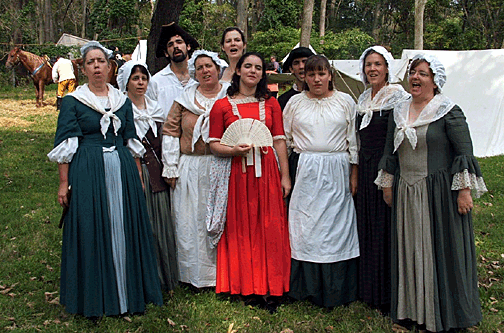 Colonial Revelers sing at Brandywine Battlefield during a summer encampment.