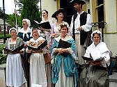 Colonial Revelers perform on Bastille Day.